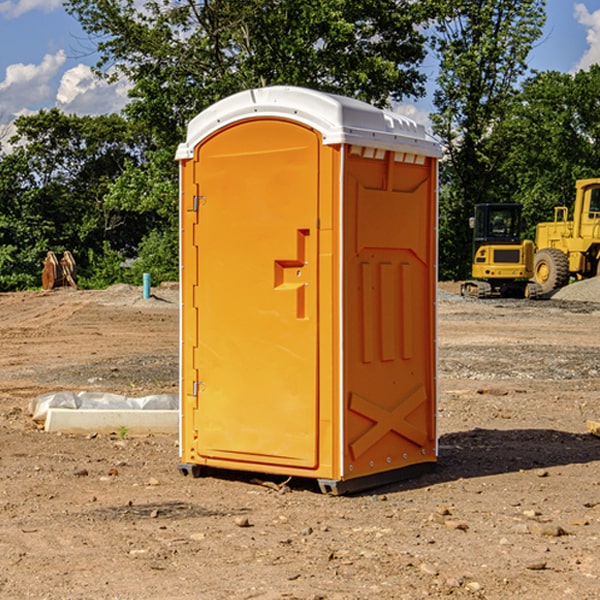 how often are the portable toilets cleaned and serviced during a rental period in Wolf Point